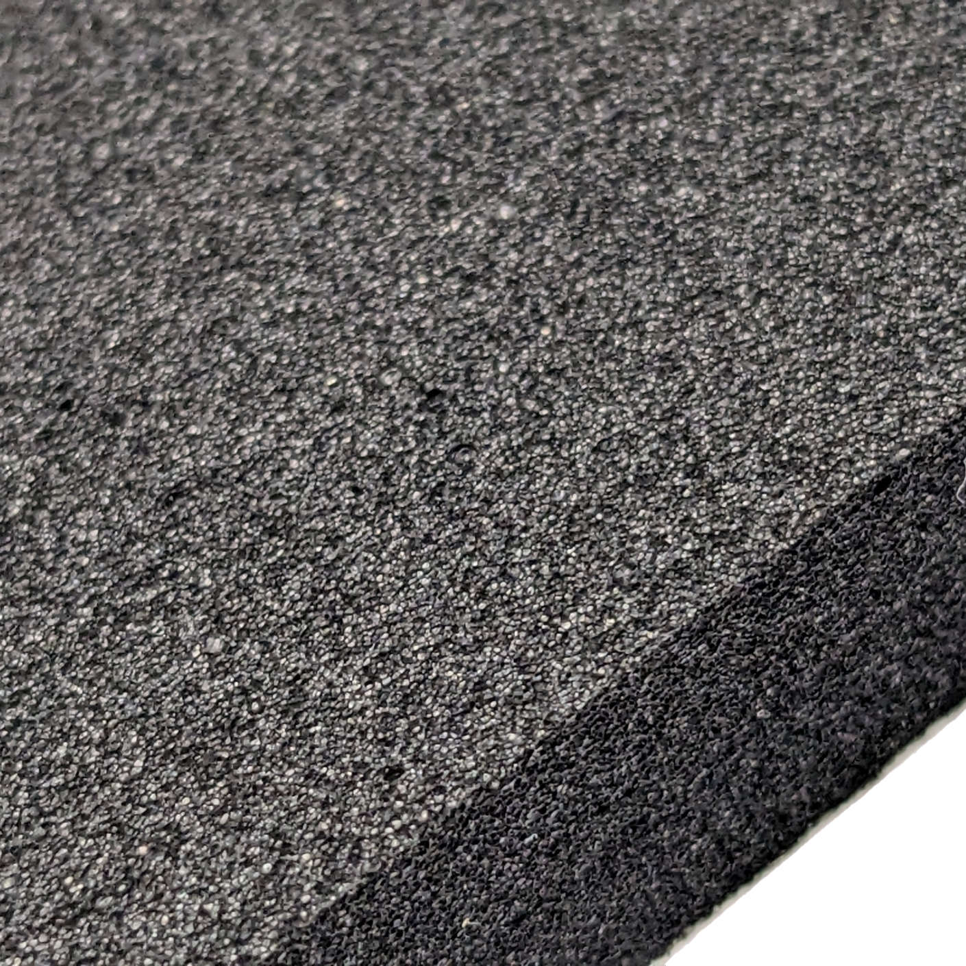 Texture Neoprene EPDM Blend P8300 Medium Soft • Pres-On Close Up of medium soft, closed cell, and black Neoprene EPDM Blended Foam